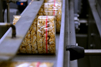 Closeup of Packaged Food On Conveyor